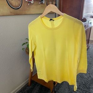 Ann Taylor, bright yellow medium size sweater with button down back.